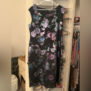 Selling black dress with flowers the brand is connected apparel the size is 16